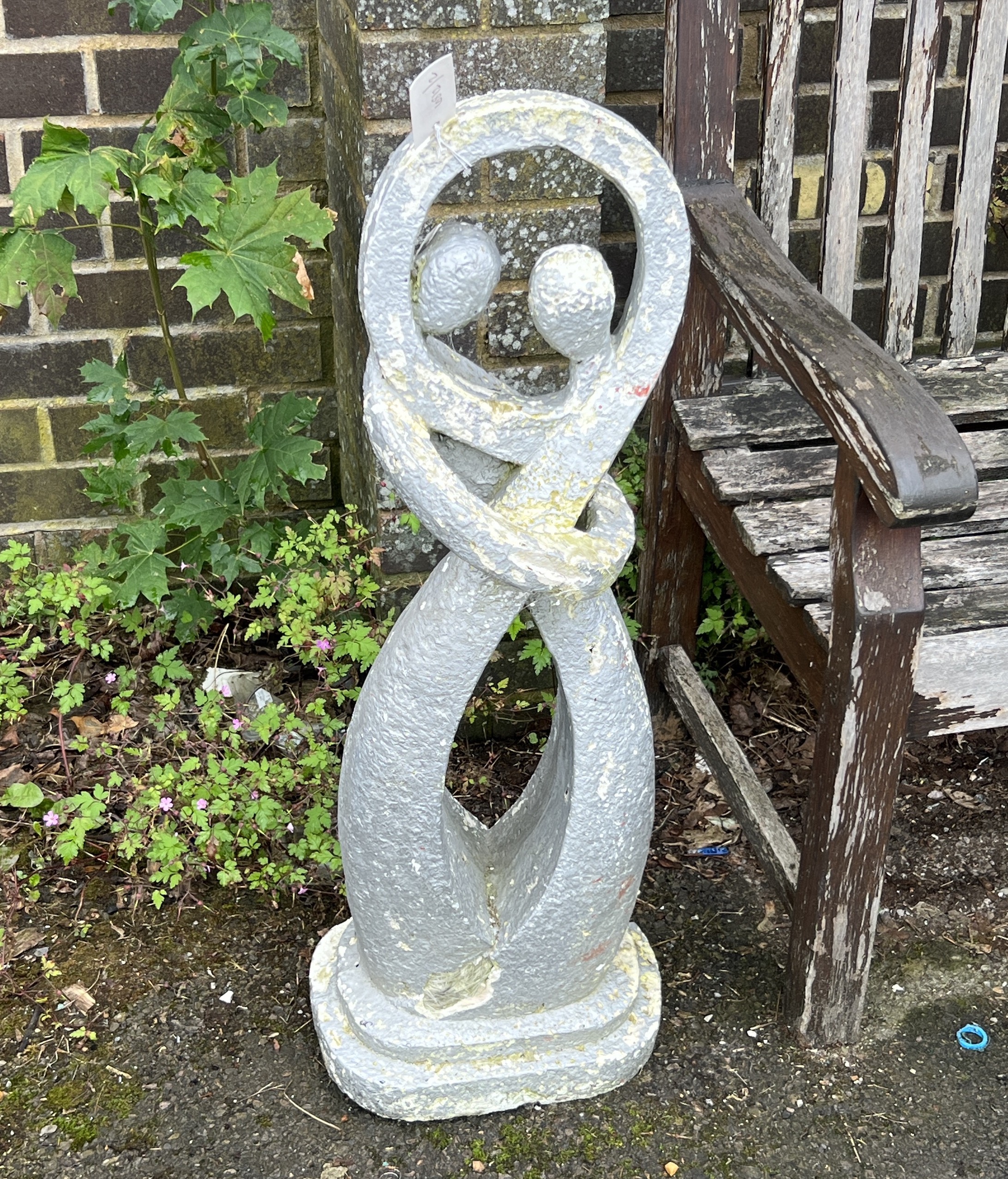 A set of eight weathered teak folding garden elbow chairs, width 60cm